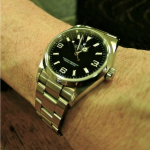 36mm rolex on man's wrist